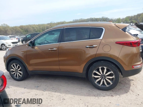 2017 Kia Sportage EX z VIN KNDPNCAC3H7113373, wystawiony jako IAAI lot #42221002 z przebiegiem 112 931 mil mil oraz . Historia ofert i sprzedaży dostępna na DreamBid. Obrazek 14.