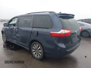 2018 Toyota Sienna XLE with VIN 5TDDZ3DC8JS197365, listed as a IAAI auction lot 42311598 with 199,121 mi miles and . Bid and sale history available at DreamBid. Image 3.