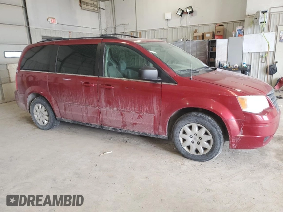 2010 Chrysler Town & Country LX with VIN 2A4RR4DE6AR198174, listed as a Copart auction lot 50757005 with 211,130 mi miles and Salvage Title. Bid and sale history available at DreamBid. Image 4.