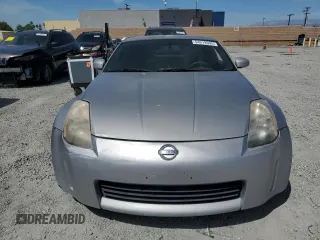 2003 Nissan 350Z Touring z VIN JN1AZ34EX3T016911, wystawiony jako Copart lot #54019395 z przebiegiem 163 228 mil mil oraz Czysty tytuł • Clean title. Historia ofert i sprzedaży dostępna na DreamBid. Obrazek 5.