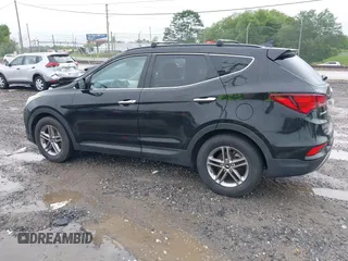 2017 Hyundai Santa Fe 2.4L z VIN 5NMZU3LB3HH011127, wystawiony jako IAAI lot #42369671 z przebiegiem 91 634 mil mil oraz . Historia ofert i sprzedaży dostępna na DreamBid. Obrazek 14.