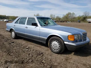 1991 Mercedes-Benz 420 with VIN WDBCA35E7MA572309, listed as a Copart auction lot 52513524 with 92,991 mi miles and Salvage Title. Bid and sale history available at carsss.com. Image 4.