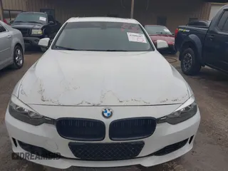 2012 BMW 3 Series 328i with VIN WBA3A5G57CNP16102, listed as a IAAI auction lot 42088407 with 70,608 mi miles and . Bid and sale history available at carsss.com. Image 6.