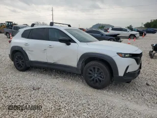 2023 Mazda CX-50 S Preferred Plus with VIN 7MMVABCM1PN105009, listed as a Copart auction lot 51235605 with 57,615 mi miles and Salvage Title. Bid and sale history available at DreamBid. Image 4.