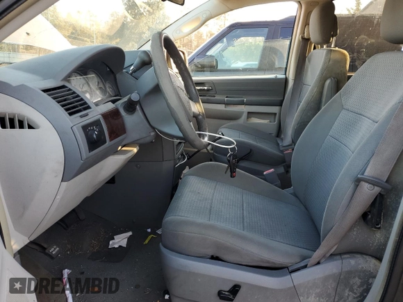 2010 Chrysler Town & Country LX with VIN 2A4RR4DE3AR344191, listed as a Copart auction lot 41399625 with 163,934 mi miles and Salvage Title. Bid and sale history available at DreamBid. Image 7.