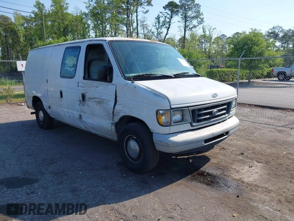 1999 Ford Econoline Cargo with VIN 1FTRE1420XHA34056, listed as a IAAI auction lot 41998411 with 236,267 mi miles. Bid and sale history available at carsss.com. Image 1.