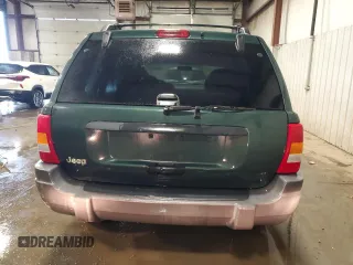 2000 Jeep Grand Cherokee Laredo with VIN 1J4GW48S2YC256123, listed as a Copart auction lot 56015855 with 147,549 mi miles and Salvage title. Bid and sale history available at DreamBid. Image 6.