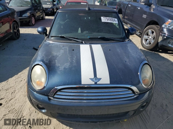 2009 MINI Convertible with VIN WMWMR33559TU96728, listed as a Copart auction lot 77949004 with 86,084 mi miles and Clean title. Bid and sale history available at DreamBid. Image 5.
