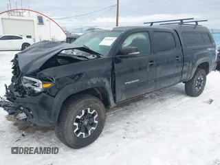 2023 Toyota Tacoma SR5 z VIN 3TMDZ5BN3PM169160, wystawiony jako IAAI lot #41276992 z przebiegiem 5 228 mil mil oraz . Historia ofert i sprzedaży dostępna na DreamBid. Obrazek 18.