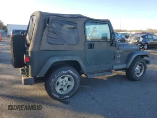 2002 Jeep Wrangler Sahara z VIN 1J4FA59S12P757177, wystawiony jako Copart lot #42808925 z przebiegiem 71 049 mil mil oraz Czysty tytuł • Clean title. Historia ofert i sprzedaży dostępna na DreamBid. Obrazek 3.