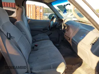 1998 Ford F-150 XL with VIN 1FTZX0724WKA18430, listed as a IAAI auction lot 41220499 with 129,780 mi miles and . Bid and sale history available at DreamBid. Image 5.
