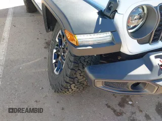 2025 Jeep Wrangler Rubicon with VIN 1C4PJXFN8SW527131, listed as a IAAI auction lot 41502676 with 1,051 mi miles and . Bid and sale history available at DreamBid. Image 6.