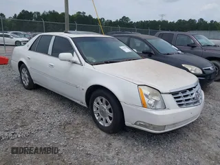 2006 Cadillac DTS 1SC z VIN 1G6KD57Y56U100346, wystawiony jako IAAI lot #42386084 z przebiegiem Nie podano mil oraz . Historia ofert i sprzedaży dostępna na DreamBid. Obrazek 1.