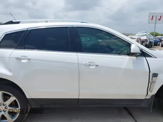 2012 Cadillac SRX Premium Collection с VIN 3GYFNCE36CS557597, выставлен на аукционе IAAI как лот 42115362 с пробегом 122 434 миль миль и . История ставок и продаж доступна на DreamBid. Изображение 14.