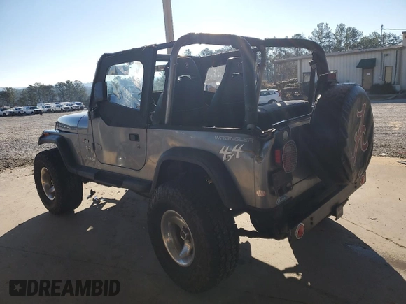 1994 Jeep Wrangler with VIN 1J4FY29S4RP471828, listed as a Copart auction lot 87893385 with 210,743 mi miles and Salvage Title. Bid and sale history available at carsss.com. Image 2.