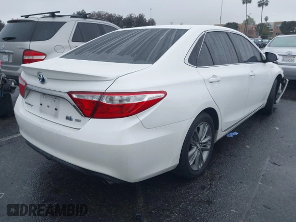 2017 Toyota Camry Hybrid LE with VIN 4T1BD1FKXHU213839, listed as a IAAI auction lot 41527665 with 113,345 mi miles. Bid and sale history available at carsss.com. Image 4.