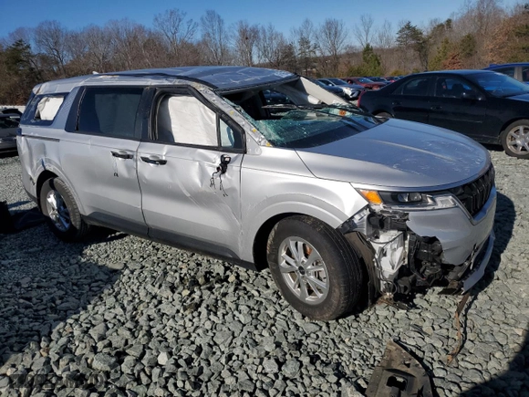 2023 Kia Carnival LX with VIN KNDNB4H35P6254056, listed as a Copart auction lot 87619955 with 0 mi miles and Salvage Title. Bid and sale history available at carsss.com. Image 4.