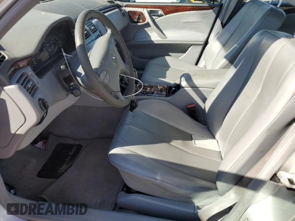 2001 Mercedes-Benz E-Class AWD with VIN WDBJH82J11X056425, listed as a Copart auction lot 48612975 with 130,900 mi miles and Salvage Title. Bid and sale history available at carsss.com. Image 7.