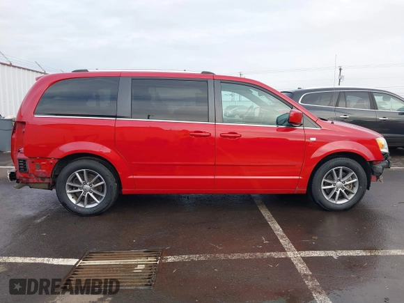2014 Dodge Grand Caravan SXT with VIN 2C4RDGCG3ER257695, listed as a IAAI auction lot 41534568 with 116,896 mi miles and . Bid and sale history available at DreamBid. Image 14.