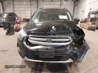 2017 Ford Escape SE with VIN 1FMCU9G98HUD67920, listed as a IAAI auction lot 40937291 with 124,302 mi miles. Bid and sale history available at carsss.com. Image 6.