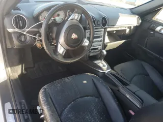 2007 Porsche Boxster S z VIN WP0CB29837U730970, wystawiony jako Copart lot #77829184 z przebiegiem Nie podano mil oraz Szkoda całkowita • Salvage title. Historia ofert i sprzedaży dostępna na DreamBid. Obrazek 8.