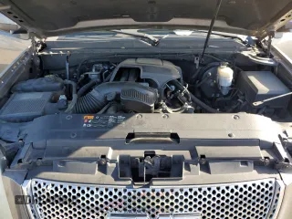 2012 GMC Yukon XL Denali z VIN 1GKS1MEF8CR157189, wystawiony jako Copart lot #55086915 z przebiegiem 172 640 mil mil oraz Szkody całkowita. Historia ofert i sprzedaży dostępna na DreamBid. Obrazek 12.