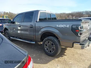 2011 Ford F-150 XLT with VIN 1FTFW1ET7BFC47792, listed as a IAAI auction lot 41765574 with 174,001 mi miles. Bid and sale history available at carsss.com. Image 3.
