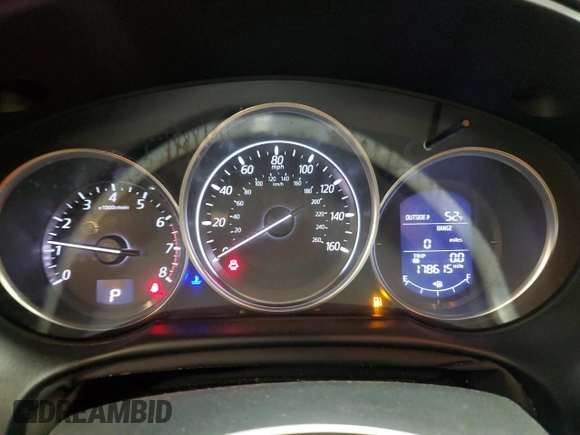 2016 Mazda CX-5 Touring z VIN JM3KE4CY4G0838908, wystawiony jako Copart lot #57961625 z przebiegiem 178 615 mil mil oraz Szkoda całkowita • Salvage title. Historia ofert i sprzedaży dostępna na DreamBid. Obrazek 9.