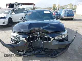 2015 BMW 4 Series 428i z VIN WBA4A9C5XFD416873, wystawiony jako IAAI lot #42108645 z przebiegiem 93 433 mil mil oraz . Historia ofert i sprzedaży dostępna na DreamBid. Obrazek 13.