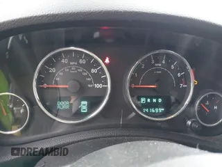 2014 Jeep Wrangler Unlimited Sport with VIN 1C4BJWDG4EL319259, listed as a IAAI auction lot 41494299 with 141,699 mi miles. Bid and sale history available at carsss.com. Image 7.