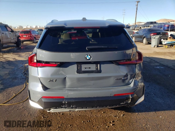 2024 BMW X1 xDrive28i with VIN WBX73EF00R5Z58004, listed as a Copart auction lot 49554055 with 4,053 mi miles and Salvage title. Bid and sale history available at DreamBid. Image 6.