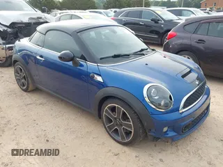 2014 MINI Coupe S z VIN WMWSX3C53ET772993, wystawiony jako IAAI lot #42266901 z przebiegiem 139 678 mil mil oraz . Historia ofert i sprzedaży dostępna na DreamBid. Obrazek 1.