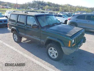 1999 Jeep Cherokee Sport with VIN 1J4FF68SXXL677013, listed as a IAAI auction lot 41993355 with 228,722 mi miles. Bid and sale history available at carsss.com. Image 1.