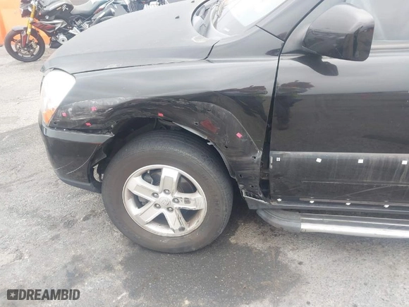 2009 Kia Sportage LX with VIN KNDJF723197611856, listed as a IAAI auction lot 41885111 with 125,260 mi miles. Bid and sale history available at carsss.com. Image 6.