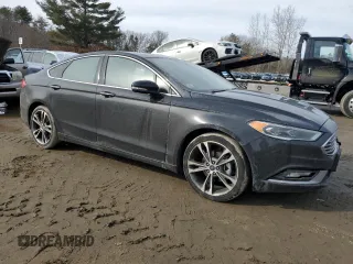 2017 Ford Fusion Titanium with VIN 3FA6P0D94HR183550, listed as a Copart auction lot 46148595 with 140,505 mi miles and Salvage title. Bid and sale history available at DreamBid. Image 4.