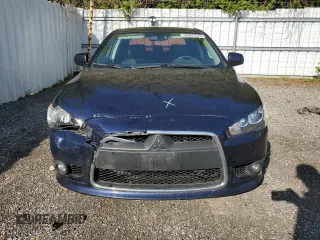 2014 Mitsubishi Lancer SE z VIN JA32V2FW2EU605184, wystawiony jako Copart lot #56007575 z przebiegiem 234 213 mil mil oraz Szkoda całkowita • Salvage title. Historia ofert i sprzedaży dostępna na DreamBid. Obrazek 5.
