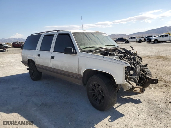1998 GMC Suburban with VIN 1GKEC16R0WJ712847, listed as a Copart auction lot 68557804 with NaN miles and Salvage Title. Bid and sale history available at carsss.com. Image 4.