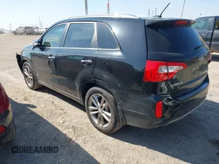 2014 Kia Sorento SX z VIN 5XYKWDA70EG455636, wystawiony jako IAAI lot #42015880 z przebiegiem 211 075 mil mil oraz . Historia ofert i sprzedaży dostępna na DreamBid. Obrazek 3.