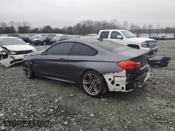 2015 BMW M4 with VIN WBS3R9C54FK330180, listed as a Copart auction lot 40706044 with 69,474 mi miles. Bid and sale history available at carsss.com. Image 2.