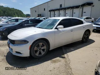 2015 Dodge Charger SXT with VIN 2C3CDXHG5FH862036, listed as a Copart auction lot 56909485 with 128,129 mi miles and Clean title. Bid and sale history available at DreamBid. Image 1.
