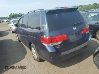 2010 Honda Odyssey EX-L z VIN 5FNRL3H73AB089714, wystawiony jako Copart lot #60276305 z przebiegiem 125 025 mil mil oraz Szkoda całkowita • Salvage title. Historia ofert i sprzedaży dostępna na DreamBid. Obrazek 2.
