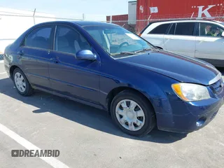 2006 Kia Spectra EX with VIN KNAFE121065254405, listed as a IAAI auction lot 41778568 with 125,646 mi miles. Bid and sale history available at carsss.com. Image 1.