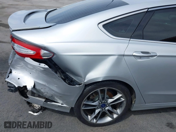 2016 Ford Fusion Titanium with VIN 3FA6P0K90GR132709, listed as a IAAI auction lot 41790873 with 63,269 mi miles and . Bid and sale history available at carsss.com. Image 6.