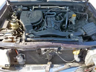 1999 Nissan Frontier XE with VIN 1N6DD26S9XC307893, listed as a Copart auction lot 66045605 with 239,269 mi miles and Salvage title. Bid and sale history available at DreamBid. Image 11.