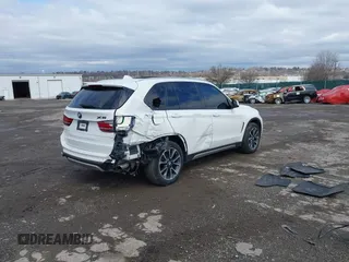 2017 BMW X5 xDrive35i with VIN 5UXKR0C3XH0X82080, listed as a IAAI auction lot 41820700 with 126,235 mi miles. Bid and sale history available at carsss.com. Image 4.