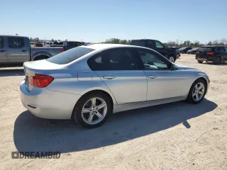 2013 BMW 3 Series 320i with VIN WBA3B1C50DK128525, listed as a Copart auction lot 48618015 with 124,304 mi miles and Salvage Title. Bid and sale history available at carsss.com. Image 3.