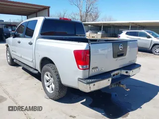 2011 Nissan Titan SV with VIN 1N6BA0EDXBN313156, listed as a IAAI auction lot 41731745 with 219,589 mi miles and . Bid and sale history available at DreamBid. Image 3.