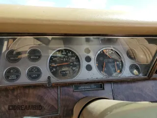 1986 Chrysler LeBaron z VIN 1C3BC55D0GG153072, wystawiony jako Copart lot #77865854 z przebiegiem 74 922 mil mil oraz Szkoda całkowita • Salvage title. Historia ofert i sprzedaży dostępna na DreamBid. Obrazek 9.