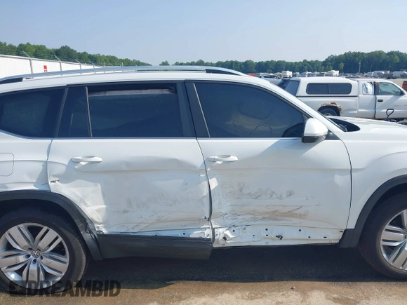 2019 Volkswagen Atlas SE with VIN 1V2UR2CA6KC549094, listed as a IAAI auction lot 42385802 with 61,718 mi miles and . Bid and sale history available at DreamBid. Image 13.