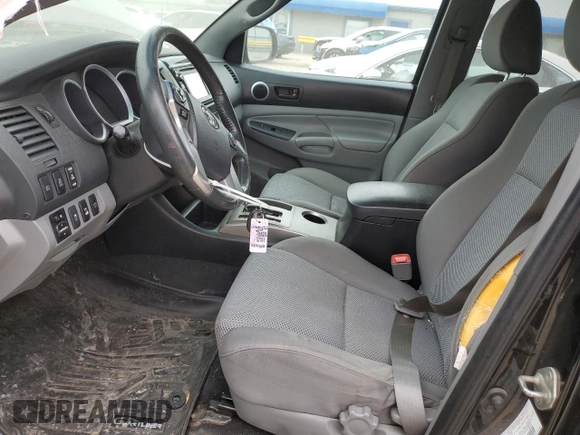 2015 Toyota Tacoma z VIN 3TMLU4EN0FM170751, wystawiony jako Copart lot #85368854 z przebiegiem 92 689 mil mil oraz Szkoda całkowita • Salvage title. Historia ofert i sprzedaży dostępna na DreamBid. Obrazek 7.